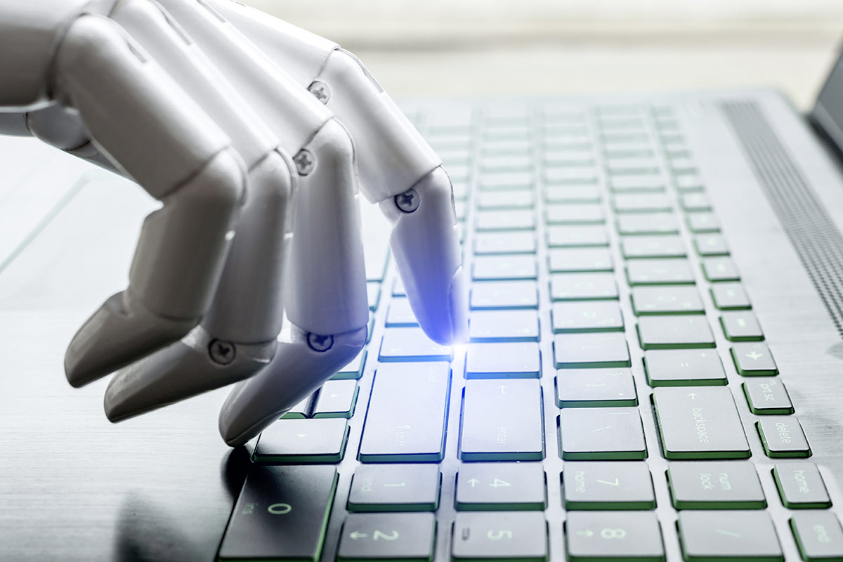 AI Automation of Medical SEO represented by a white robotic hand typing on a keyboard.