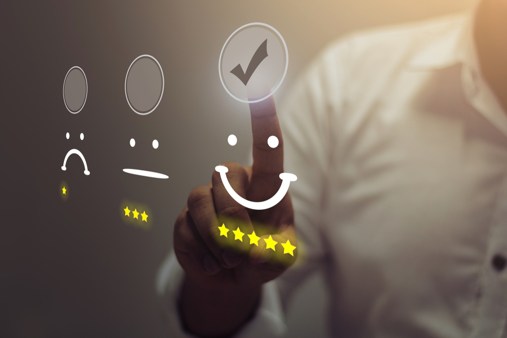 Graphic representation of customer satisfaction levels with a five-star rating system and emoticons.